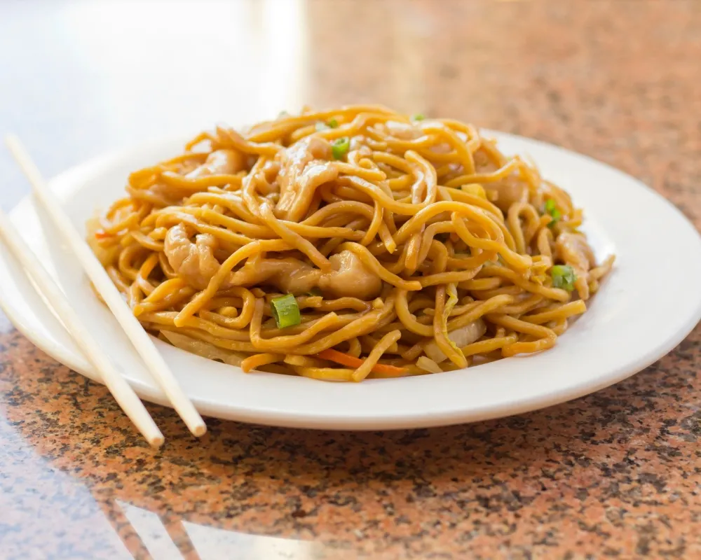 Savory chicken lo mein mixed with fresh vegetables at China Star Chinese Buffet，a Chinese Restaurant in Waco