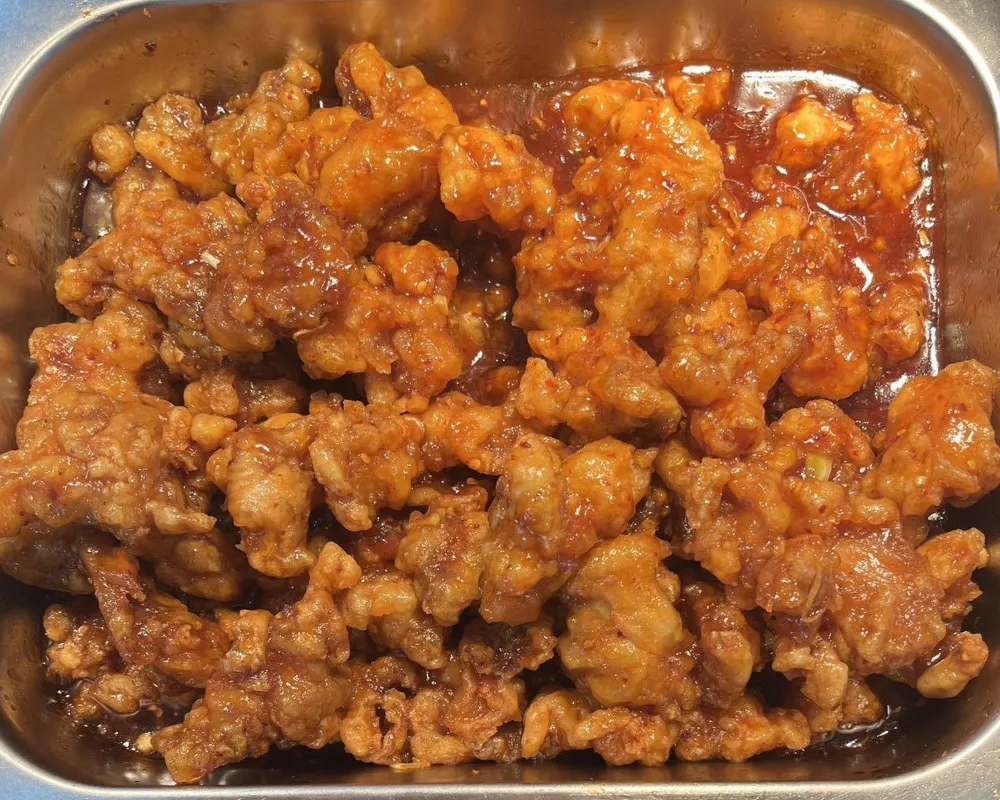 Sweet and sour crispy pork bites with glossy sauce at China Star Chinese Buffet，a Chinese Restaurant in Waco